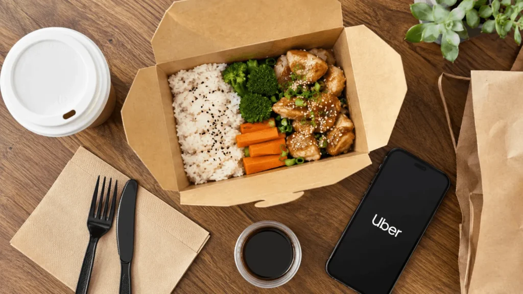 American Express Gold Card Annual Fee: What You'll Actually Pay 2 Takeout food and coffee representing how the Amex Gold Card annual fee dining credit is used